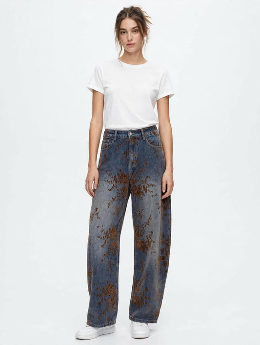 JEANS IN DENIM CON STAMPA FLOREALE MARRONE